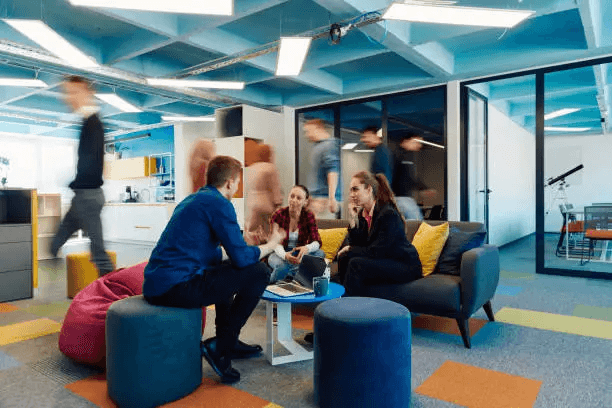 Business team collaborating around customer metrics